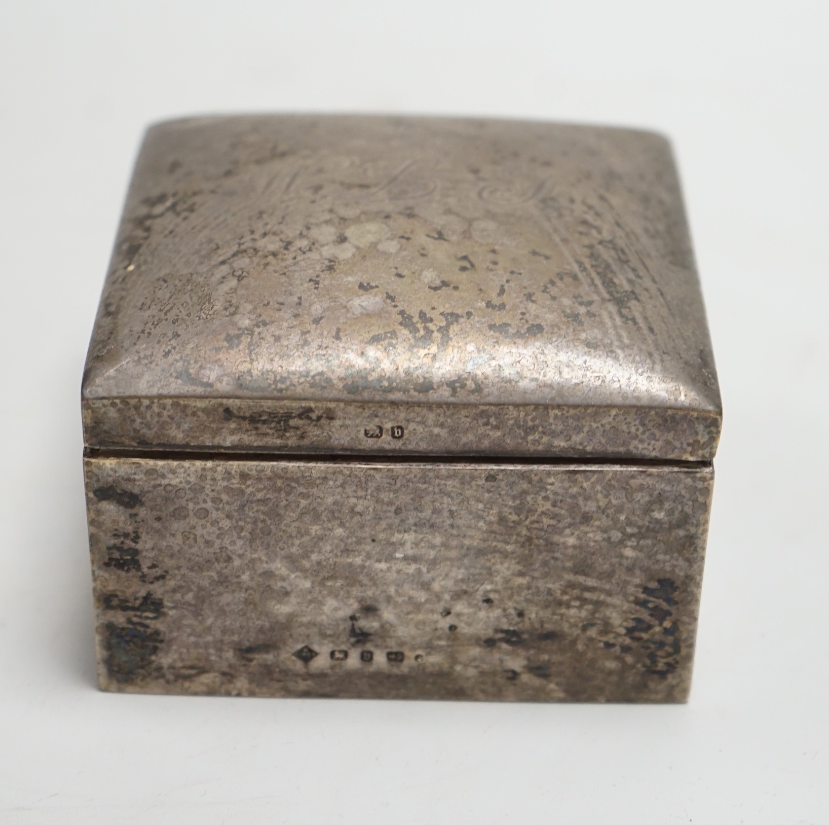 A late Victorian silver mounted square cigarette box, Mappin Bros, Birmingham, 1895, 89mm.